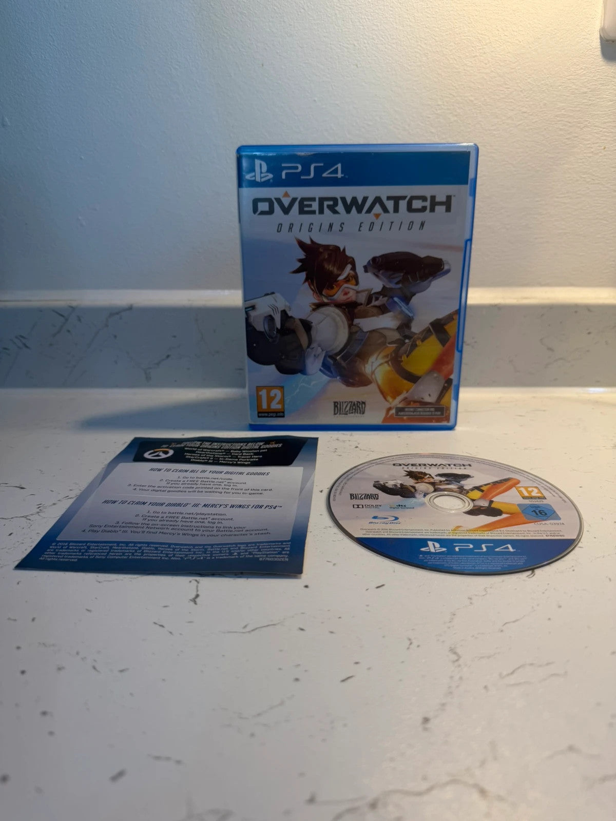 Overwatch Origins Edition PS4 game with original case and disc in very good condition.