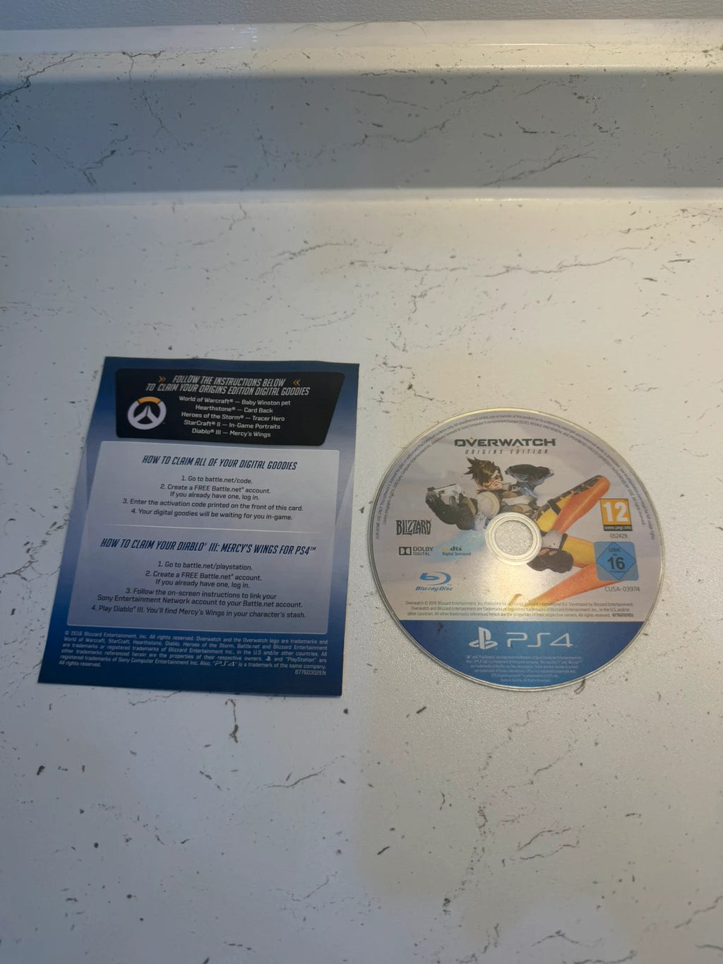 Overwatch Origins Edition PS4 game with original case and disc in very good condition.