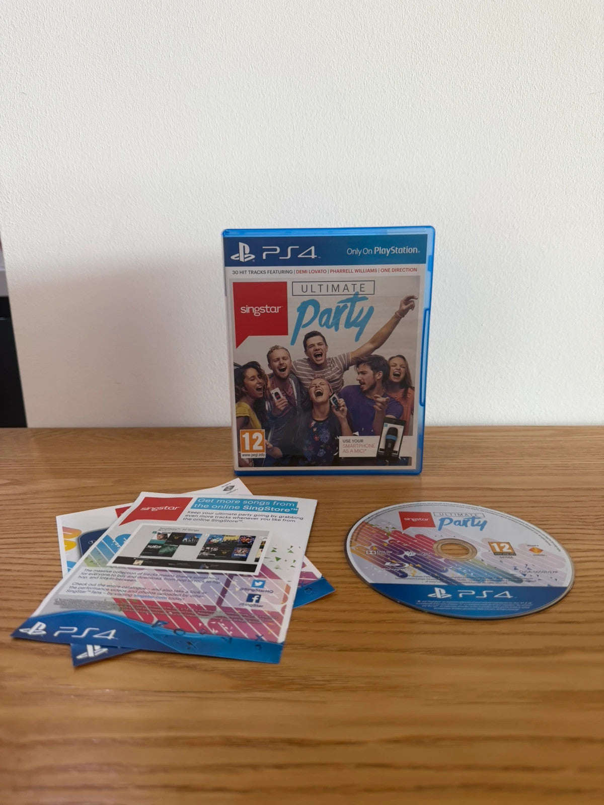 originals SingStar Ultimate Party PS4 game case with vibrant cover art and disc.