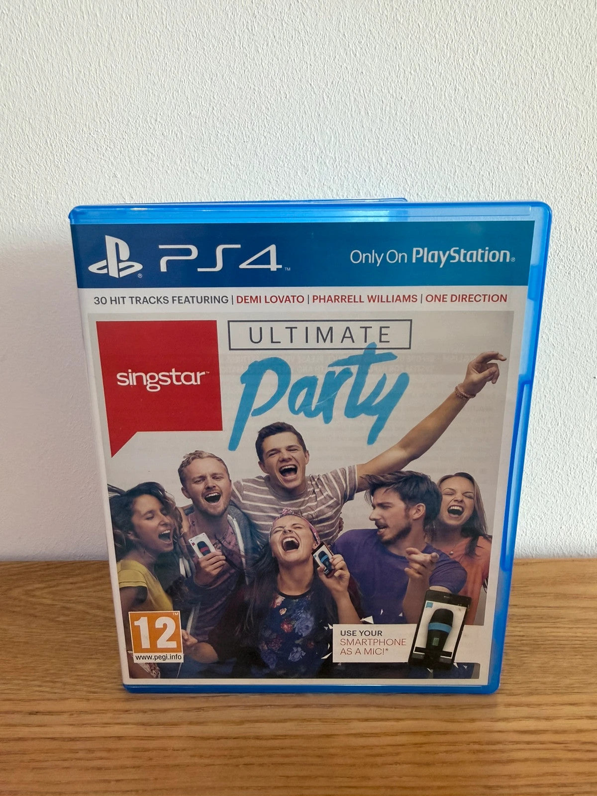 originals SingStar Ultimate Party PS4 game case with vibrant cover art and disc.