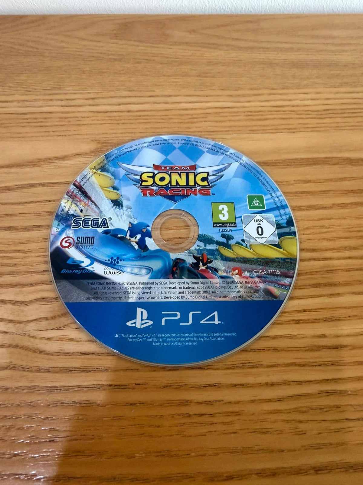 originals Team Sonic Racing PS4 game disc with slight surface scratches, no case included.