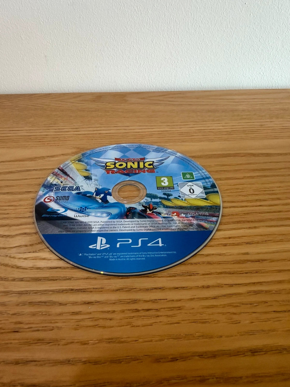 originals Team Sonic Racing PS4 game disc with slight surface scratches, no case included.