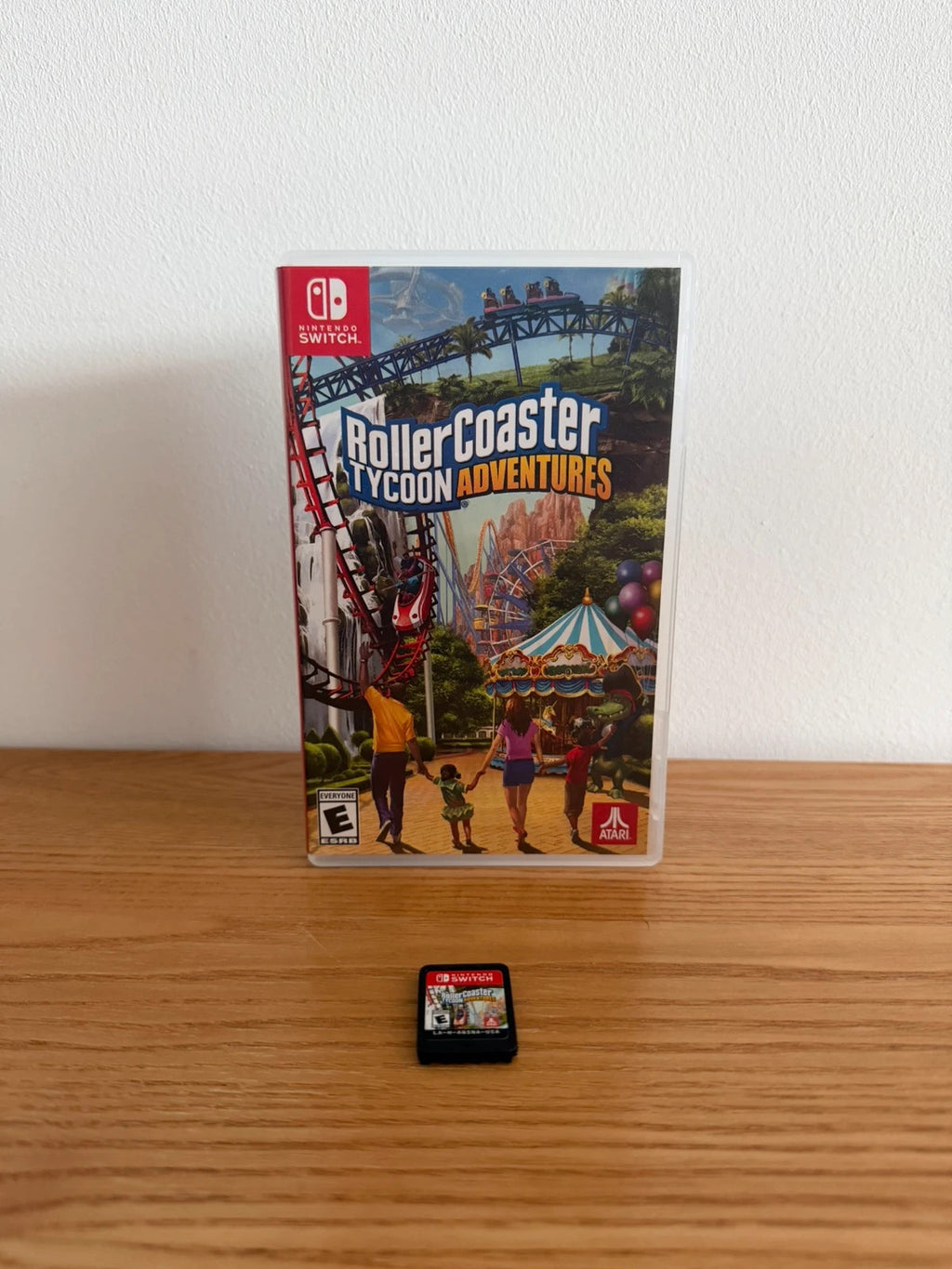 originals RollerCoaster Tycoon Adventures Nintendo Switch game cartridge with original case and cover.