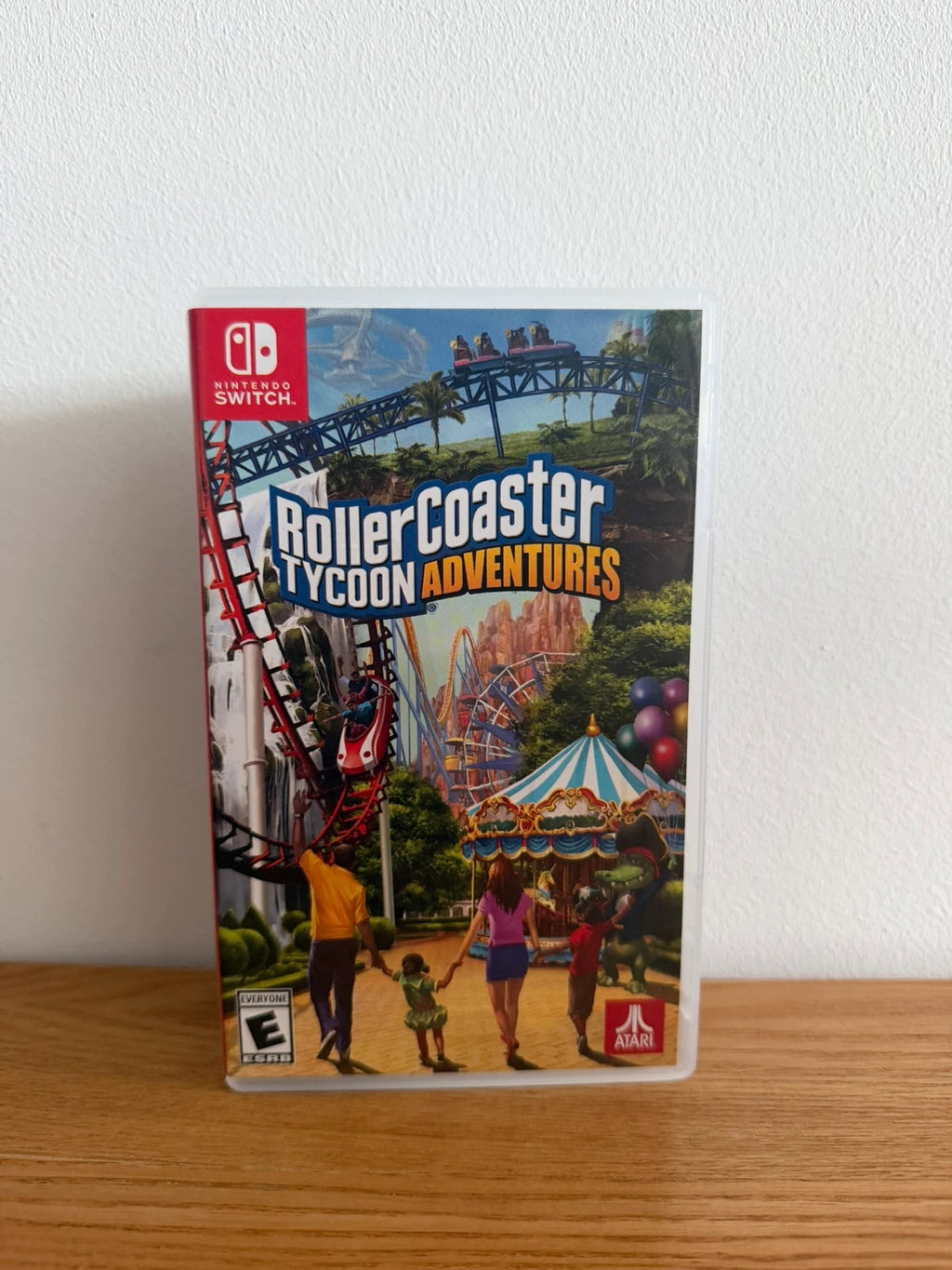 originals RollerCoaster Tycoon Adventures Nintendo Switch game cartridge with original case and cover.