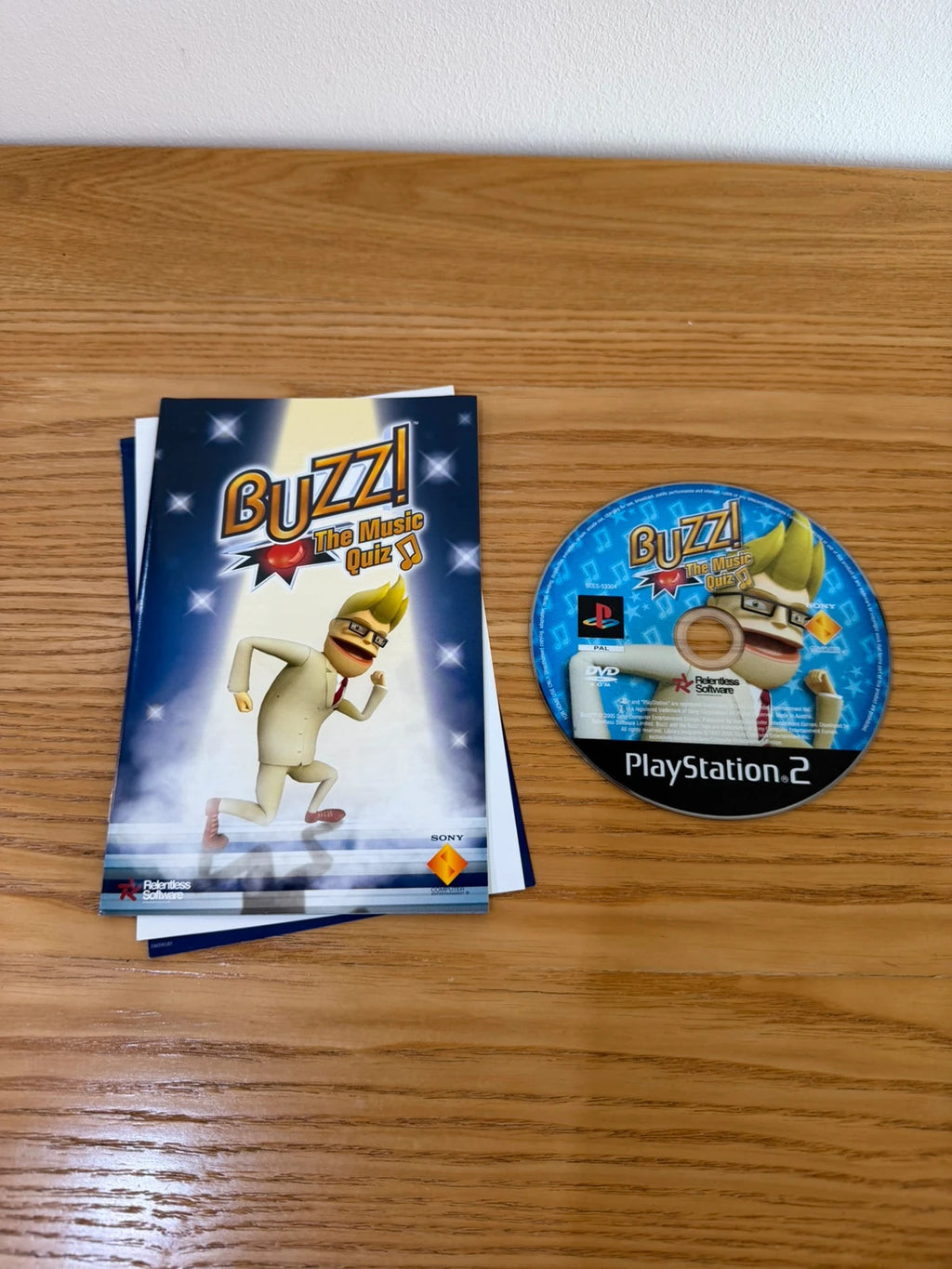 originals video game accessories grey wired Buzz controllers with logo and game case