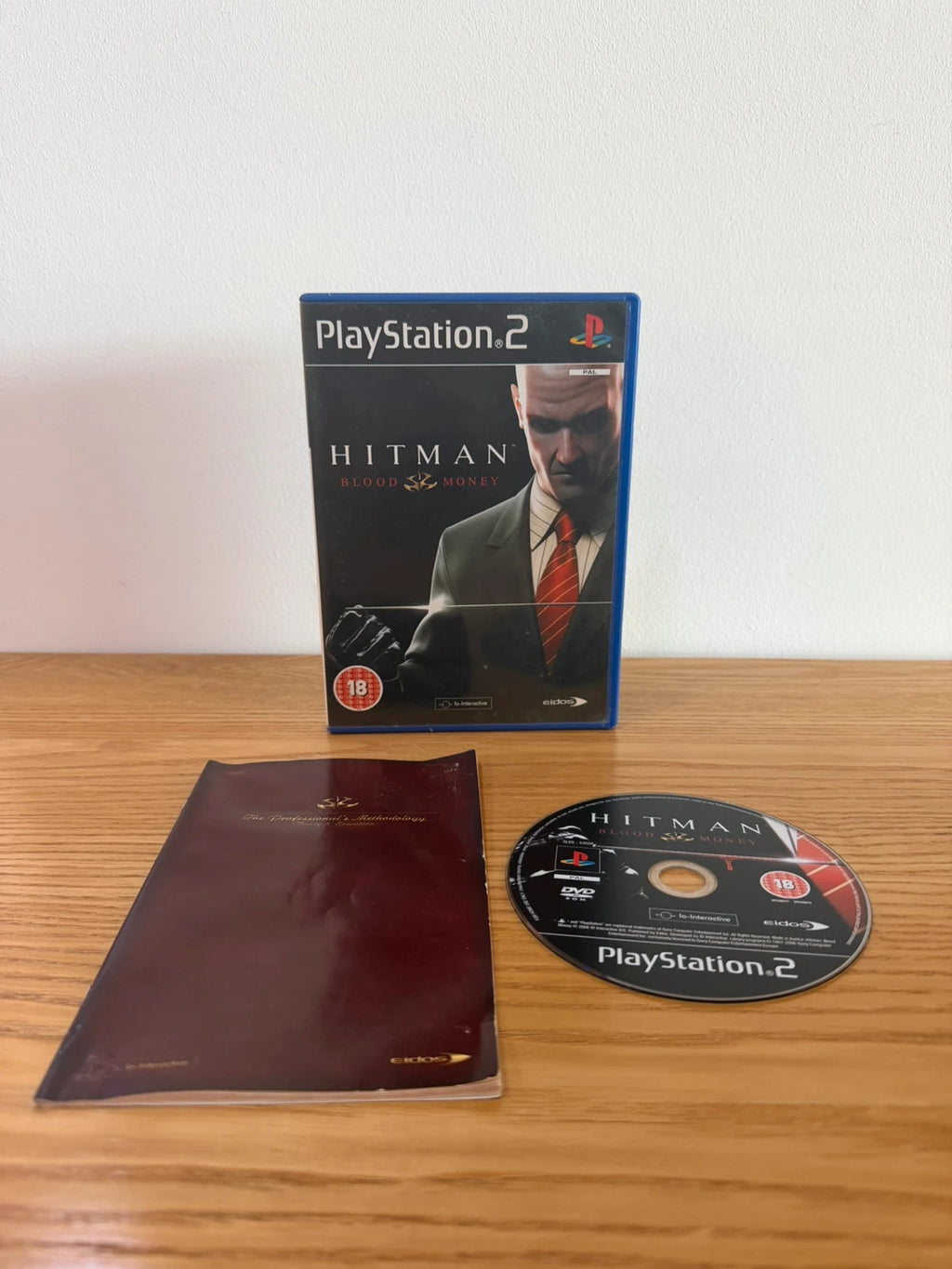 Multiples Hitman Blood Money PS2 game complete with manual and case in very good condition.