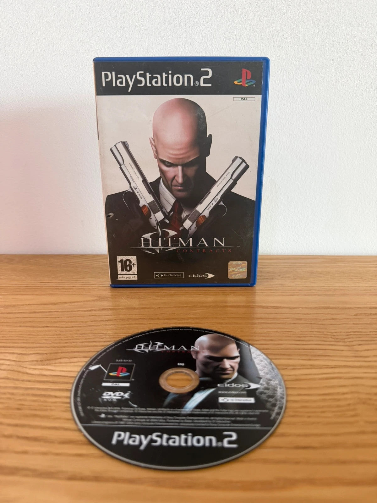 Multiples Hitman Contracts PS2 game case with disc, very good condition, no manual.