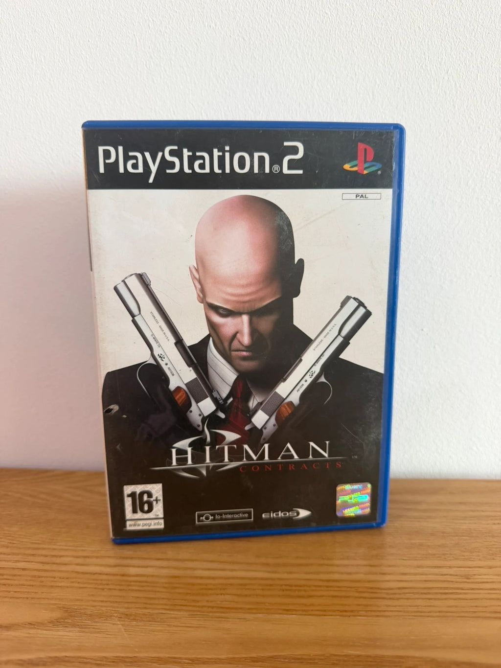 Multiples Hitman Contracts PS2 game case with disc, very good condition, no manual.