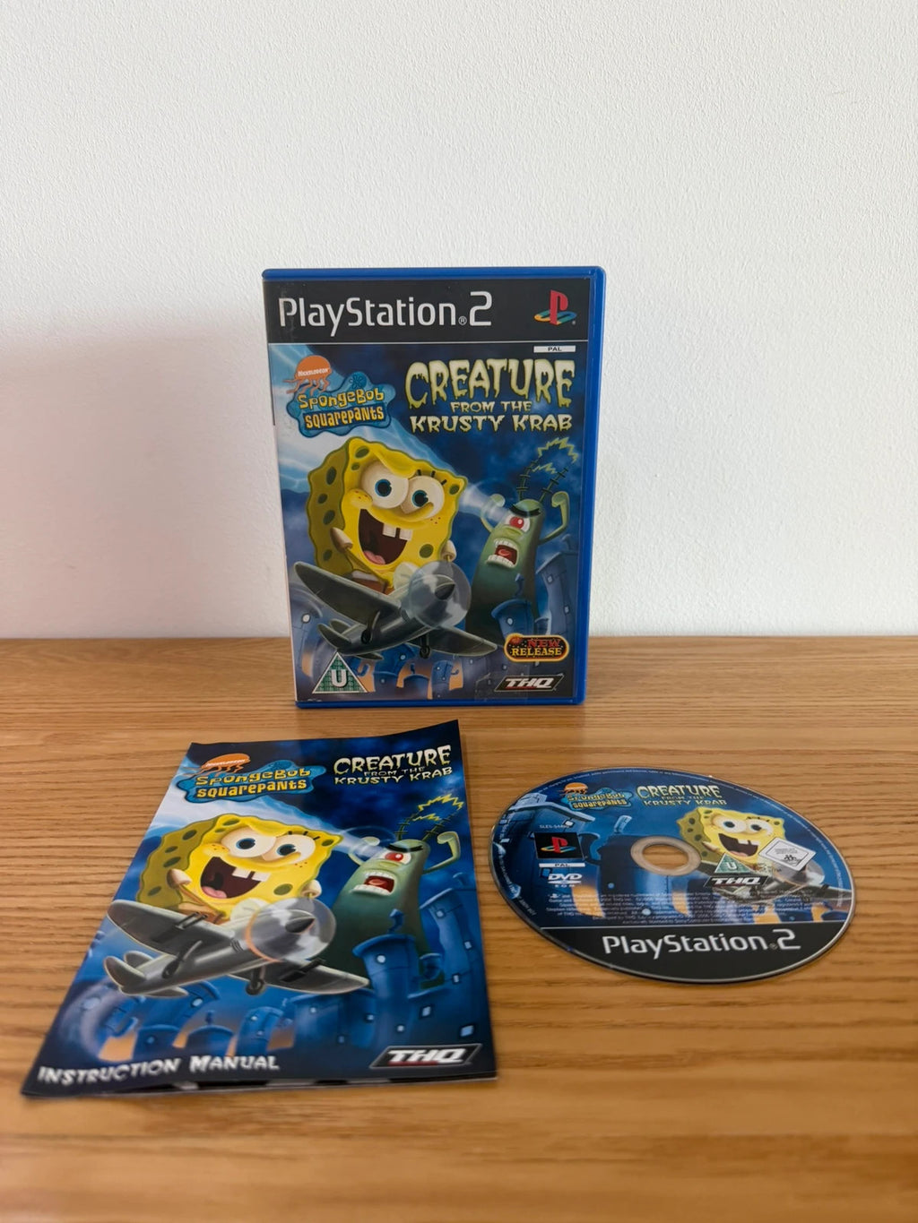 Multiples SpongeBob SquarePants PS2 game with colorful cover art and manual included.