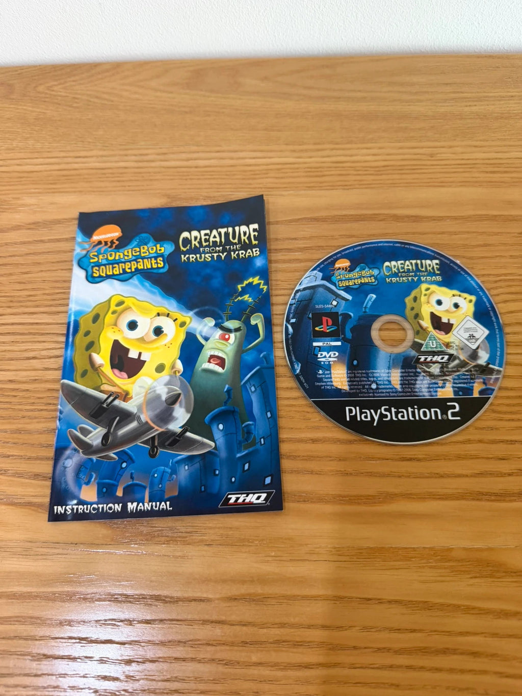 Multiples SpongeBob SquarePants PS2 game with colorful cover art and manual included.