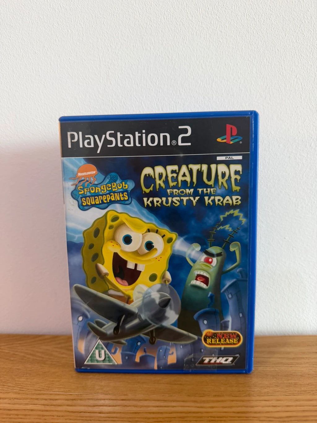 Multiples SpongeBob SquarePants PS2 game with colorful cover art and manual included.