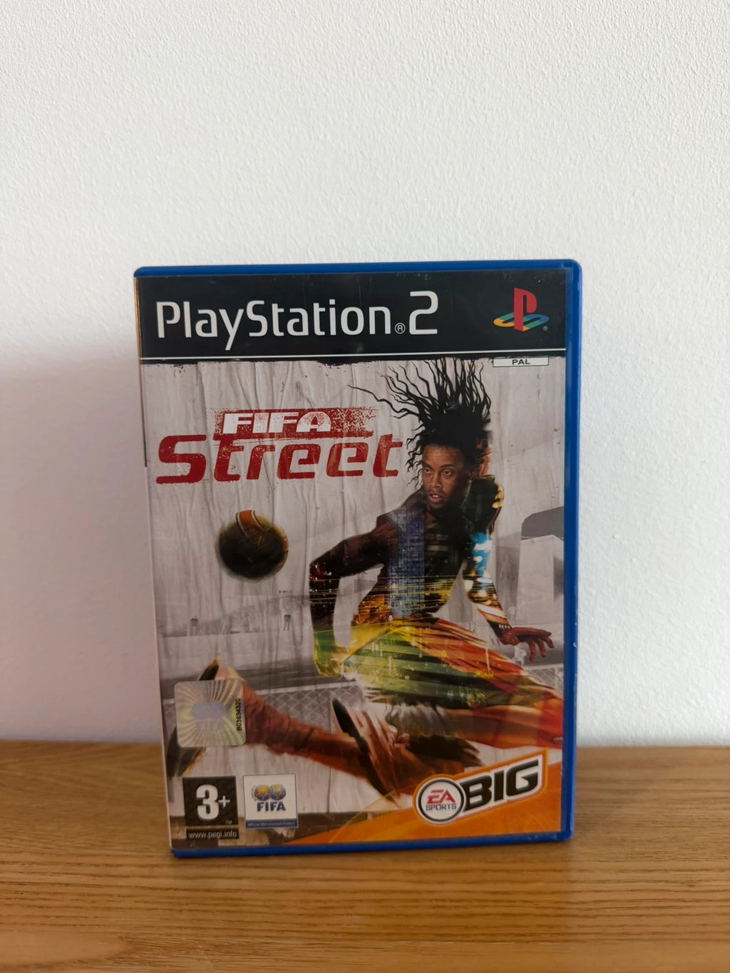Multiples FIFA Street PS2 game complete with manual, very good condition, slight surface marks.