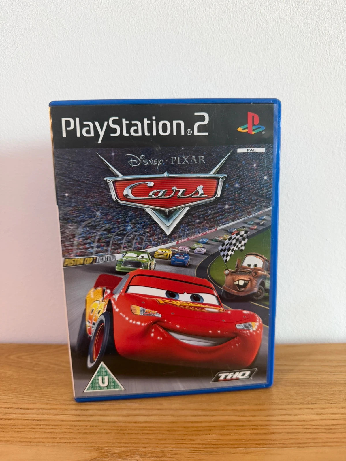 Disney Pixar Cars PS2 game complete with manual, case, and disc in very good condition.