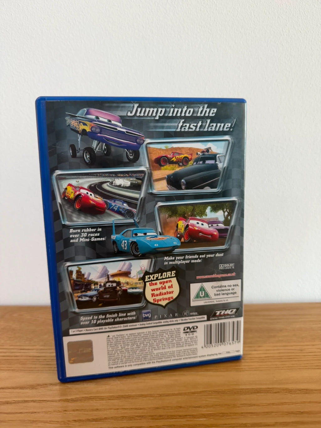 Disney Pixar Cars PS2 game complete with manual, case, and disc in very good condition.