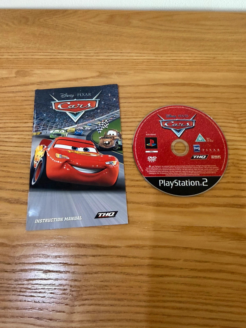 Disney Pixar Cars PS2 game complete with manual, case, and disc in very good condition.