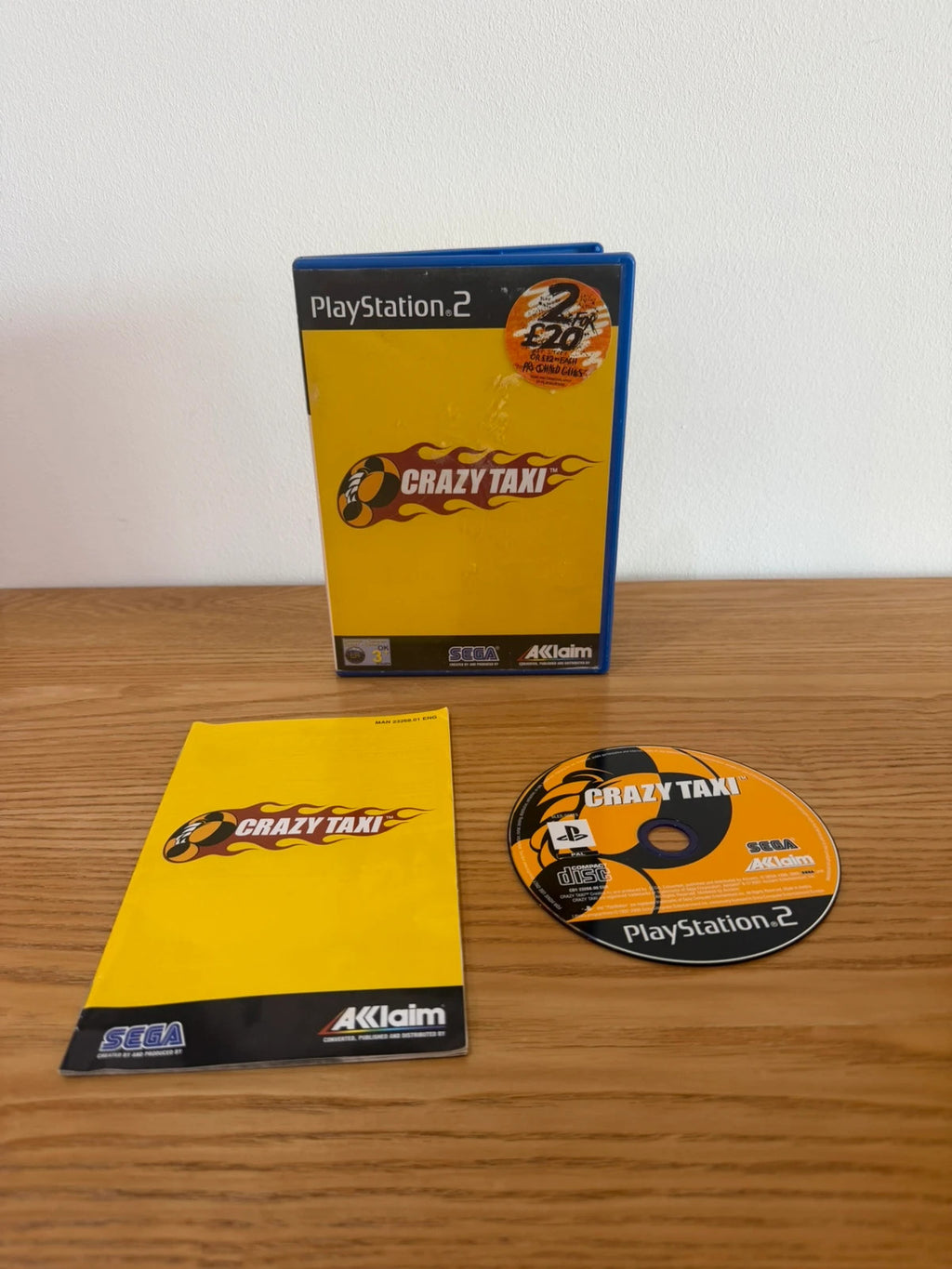 Multiples Crazy Taxi PS2 game complete with manual, very good condition, slight surface marks.