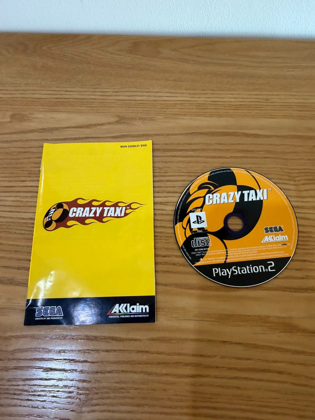 Multiples Crazy Taxi PS2 game complete with manual, very good condition, slight surface marks.