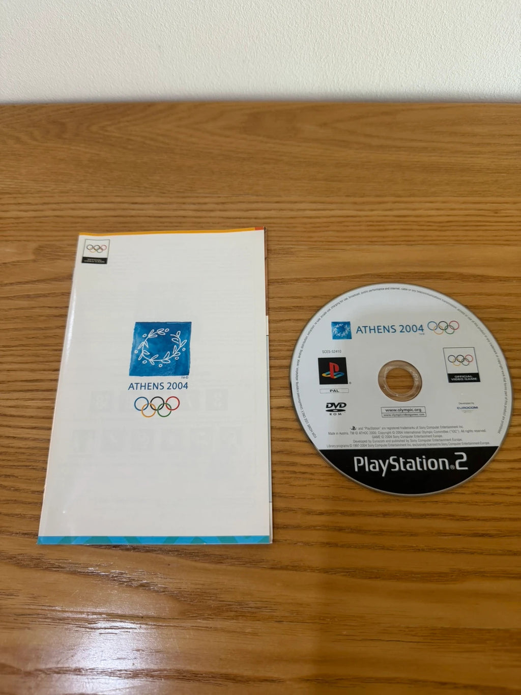 Multiples Athens 2004 PS2 game complete with manual, very good condition, slight surface marks.