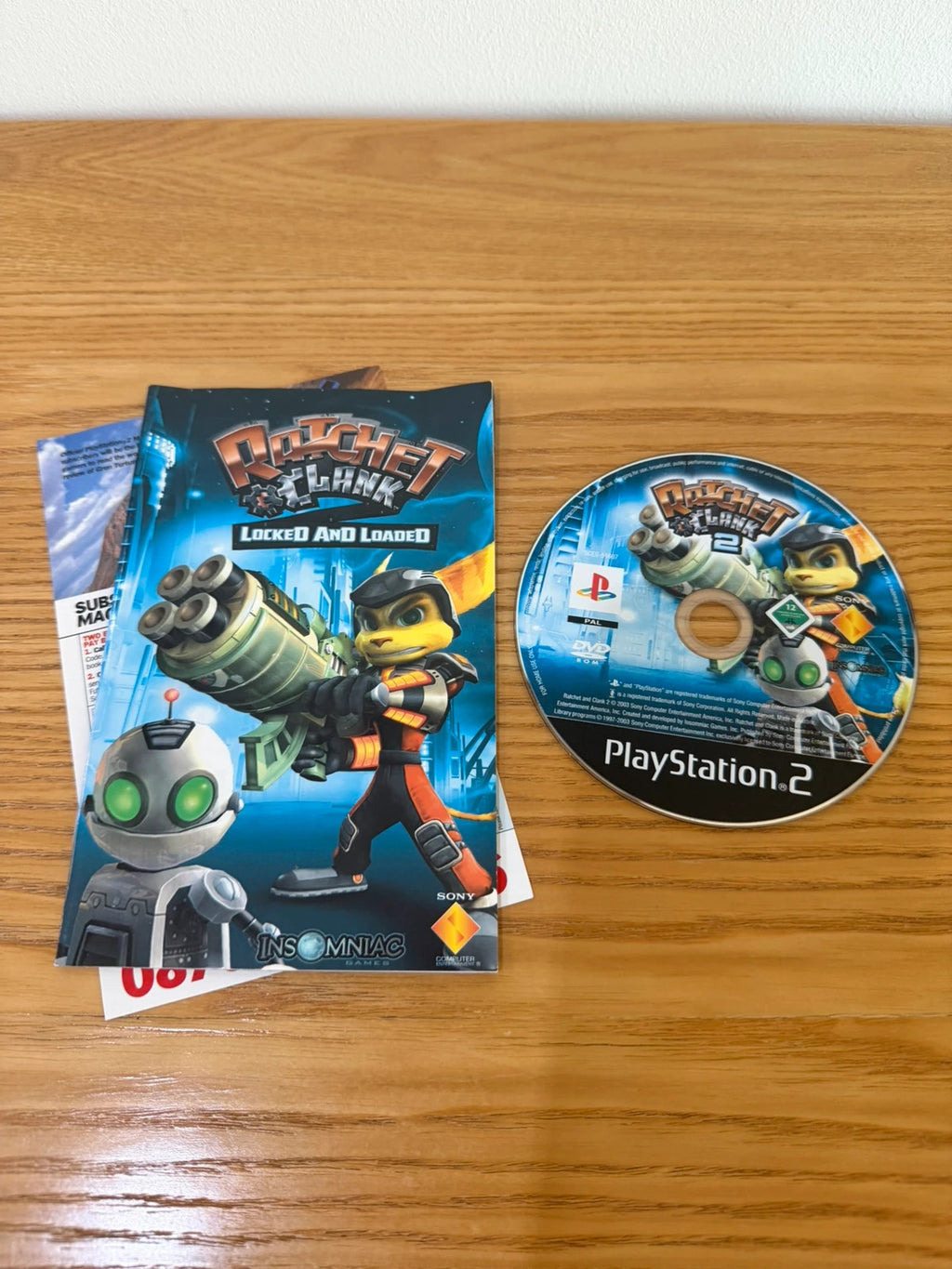 Multiples video game accessory Ratchet & Clank 2 PS2 complete with manual and case.