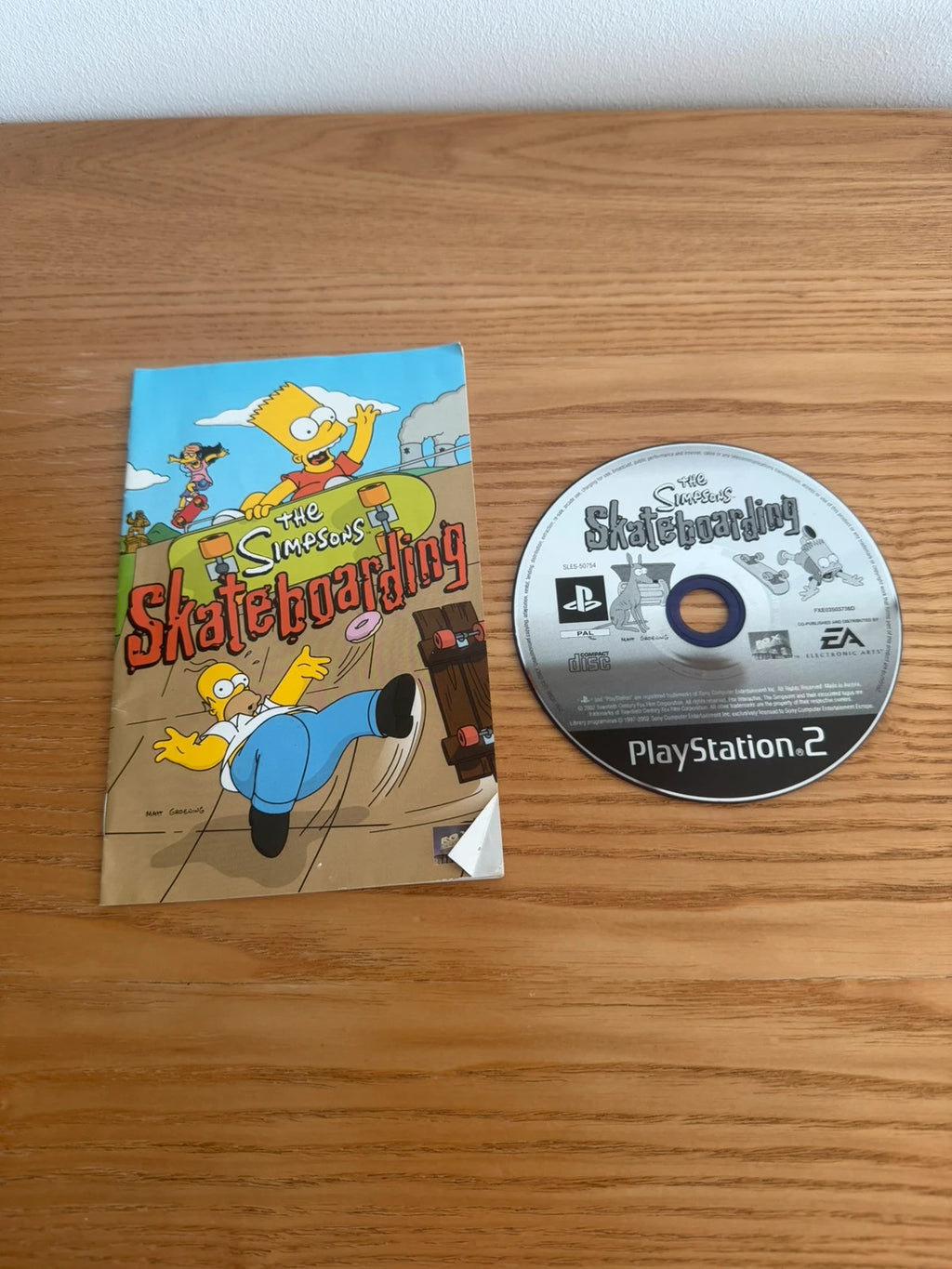 Multiples video game accessory The Simpsons Skateboarding PS2 complete with manual and case.