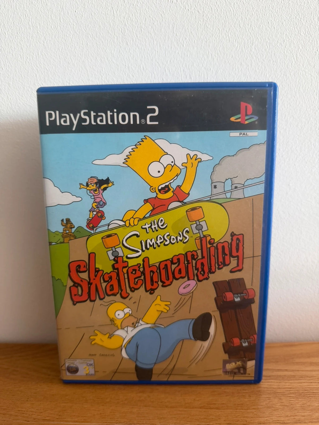 Multiples video game accessory The Simpsons Skateboarding PS2 complete with manual and case.