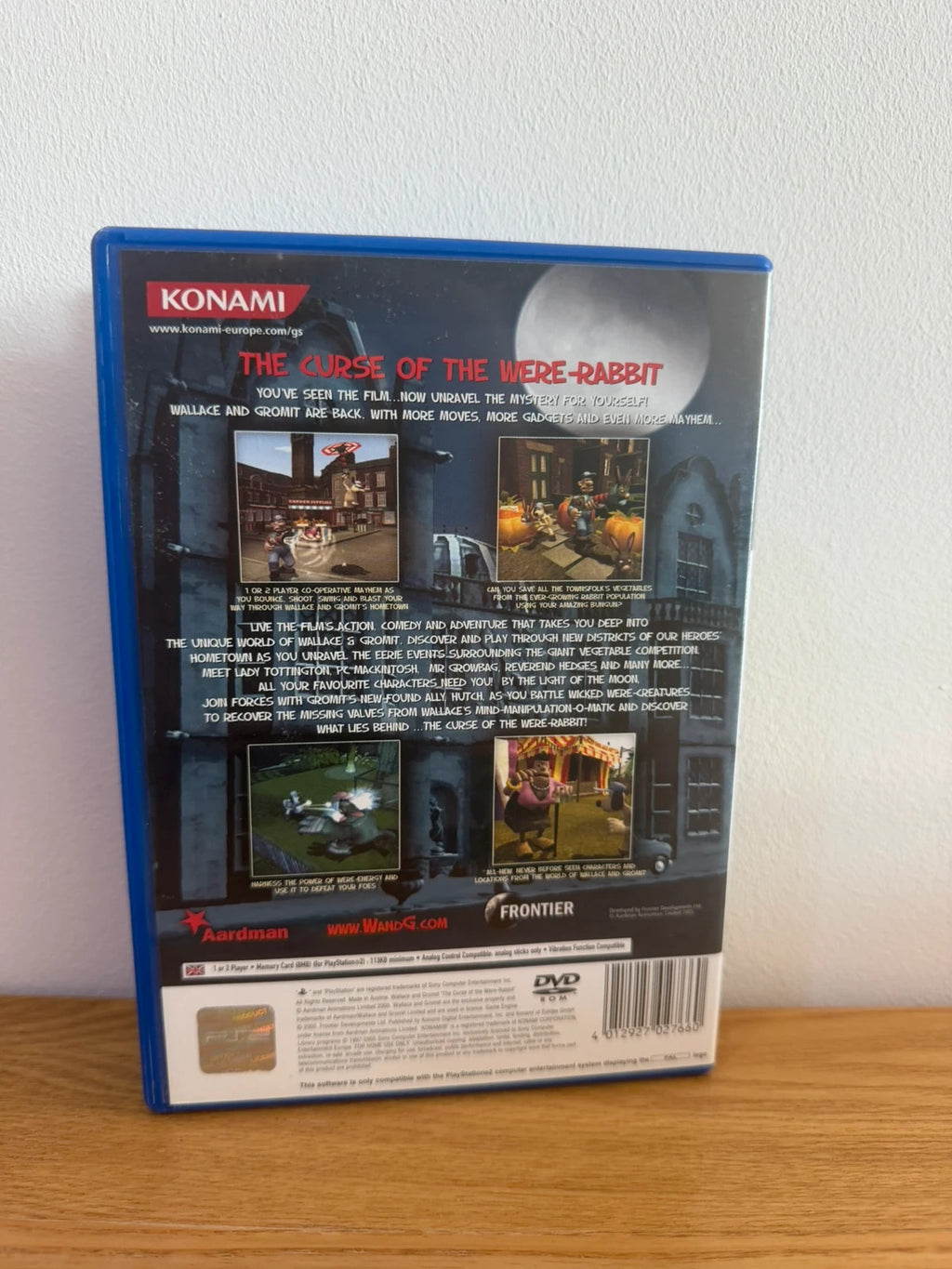 Multiples video game accessory Wallace & Gromit PS2 game case with manual and disc.