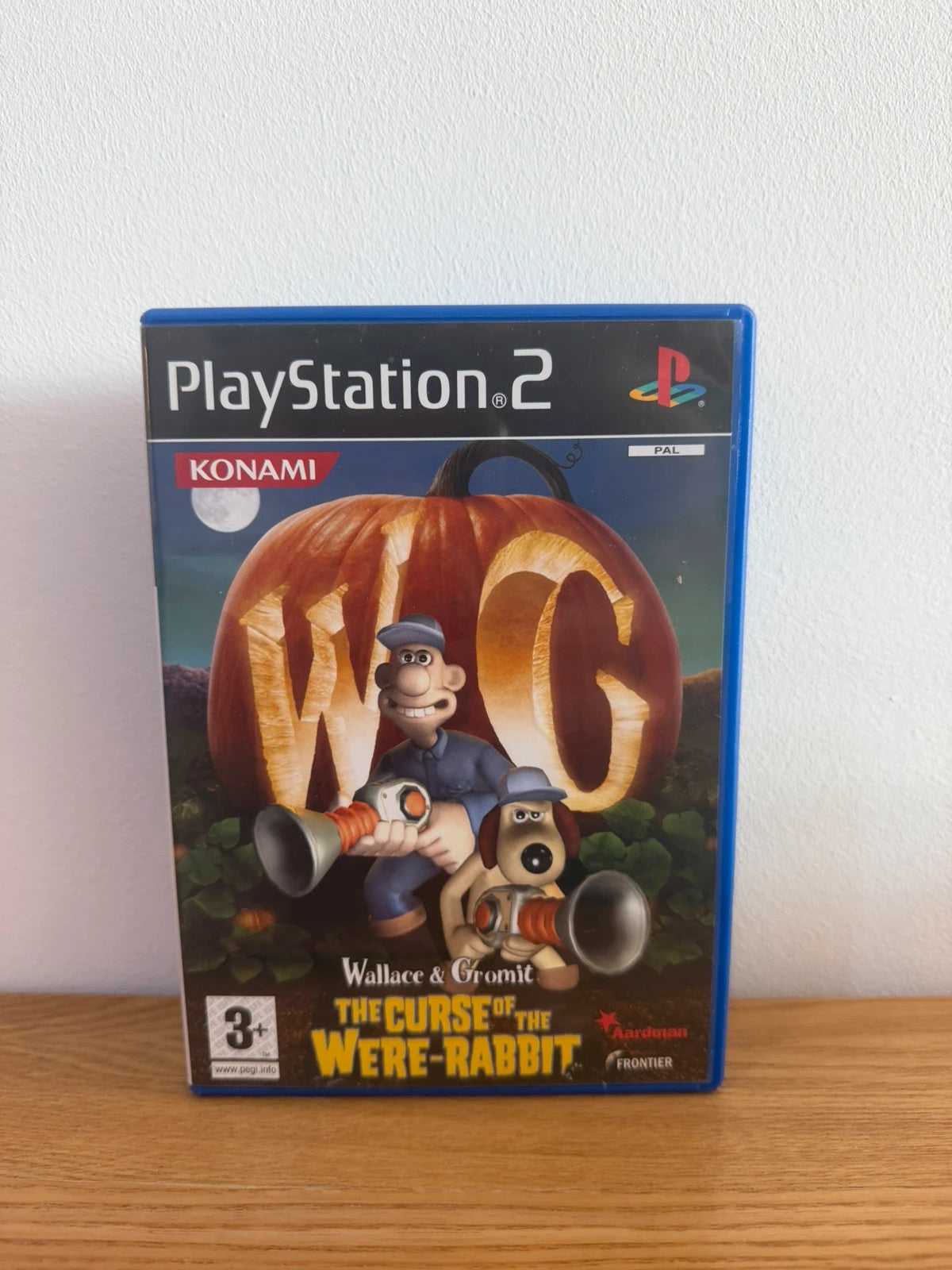 Multiples video game accessory Wallace & Gromit PS2 game case with manual and disc.