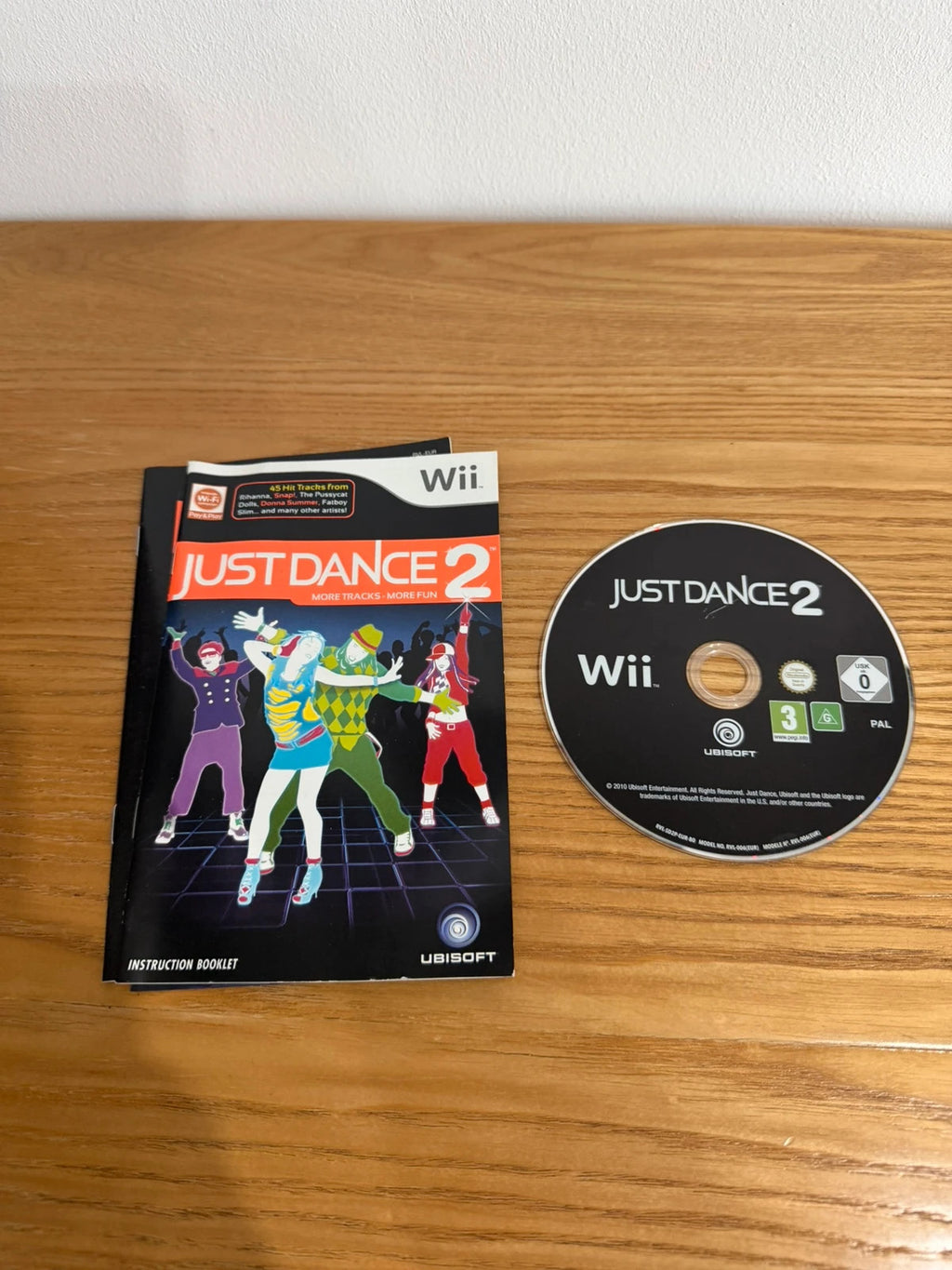 Just Dance 2 video game for Nintendo Wii, complete with case, disc, and manual.