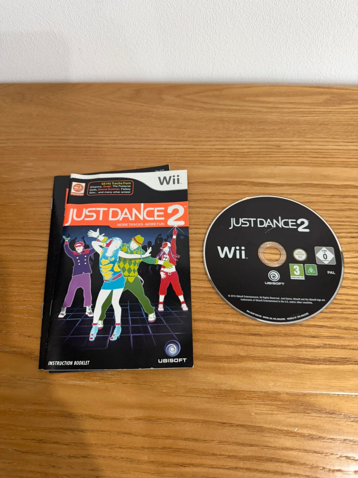 Just Dance 2 video game for Nintendo Wii, complete with case, disc, and manual.