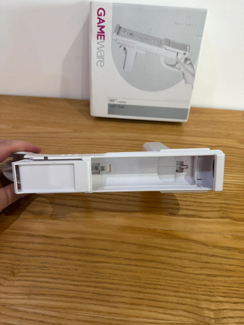 GameWare white Wii compatible light gun in original box, very good condition.