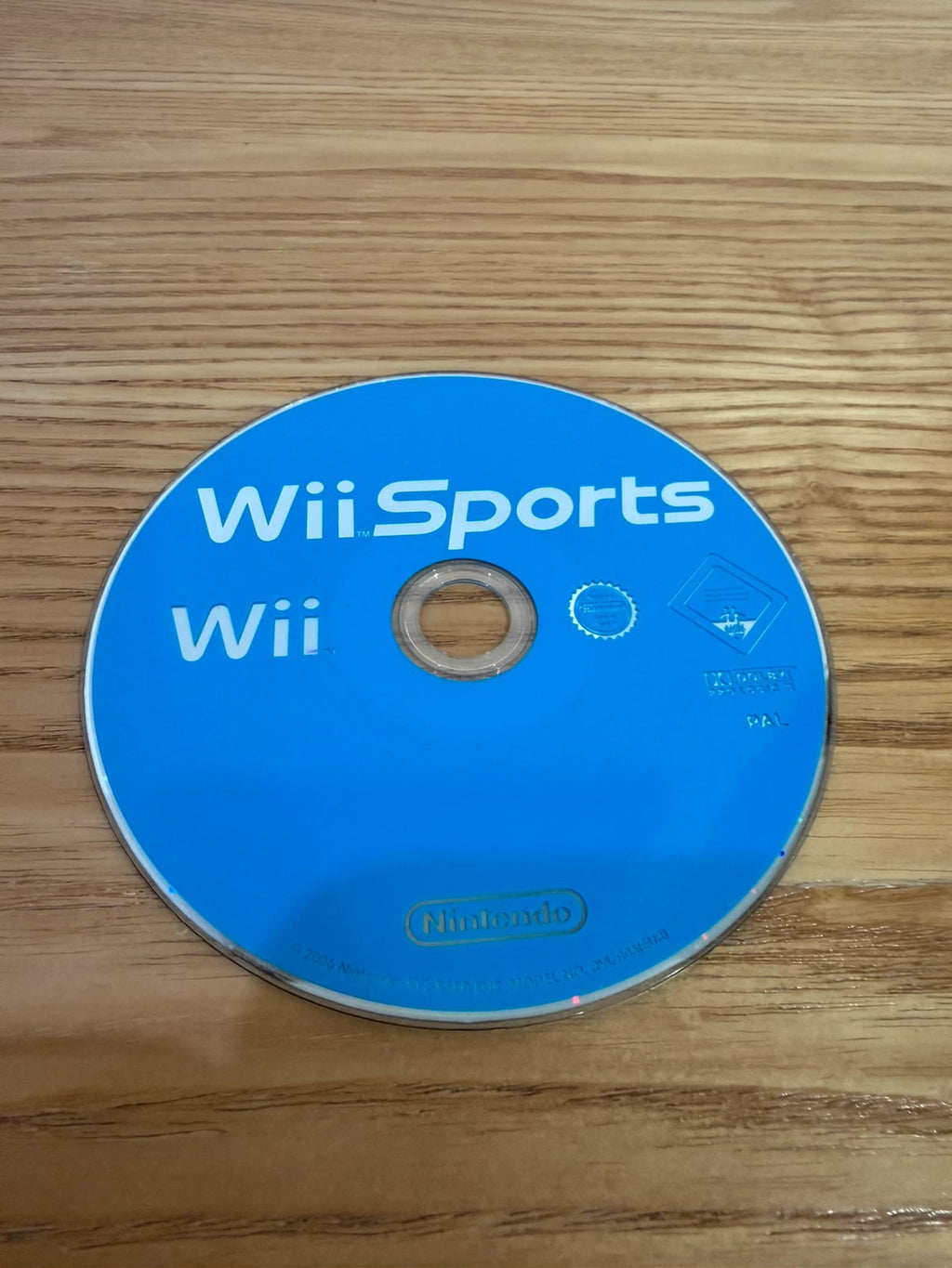 Nintendo Wii Sports game disc with minimal surface marks, tested and in very good condition.
