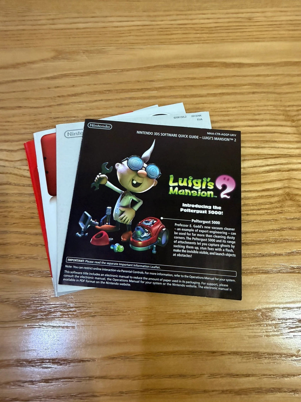 Luigi's Mansion 2 Nintendo 3DS game case with cover artwork and inserts, very good condition.
