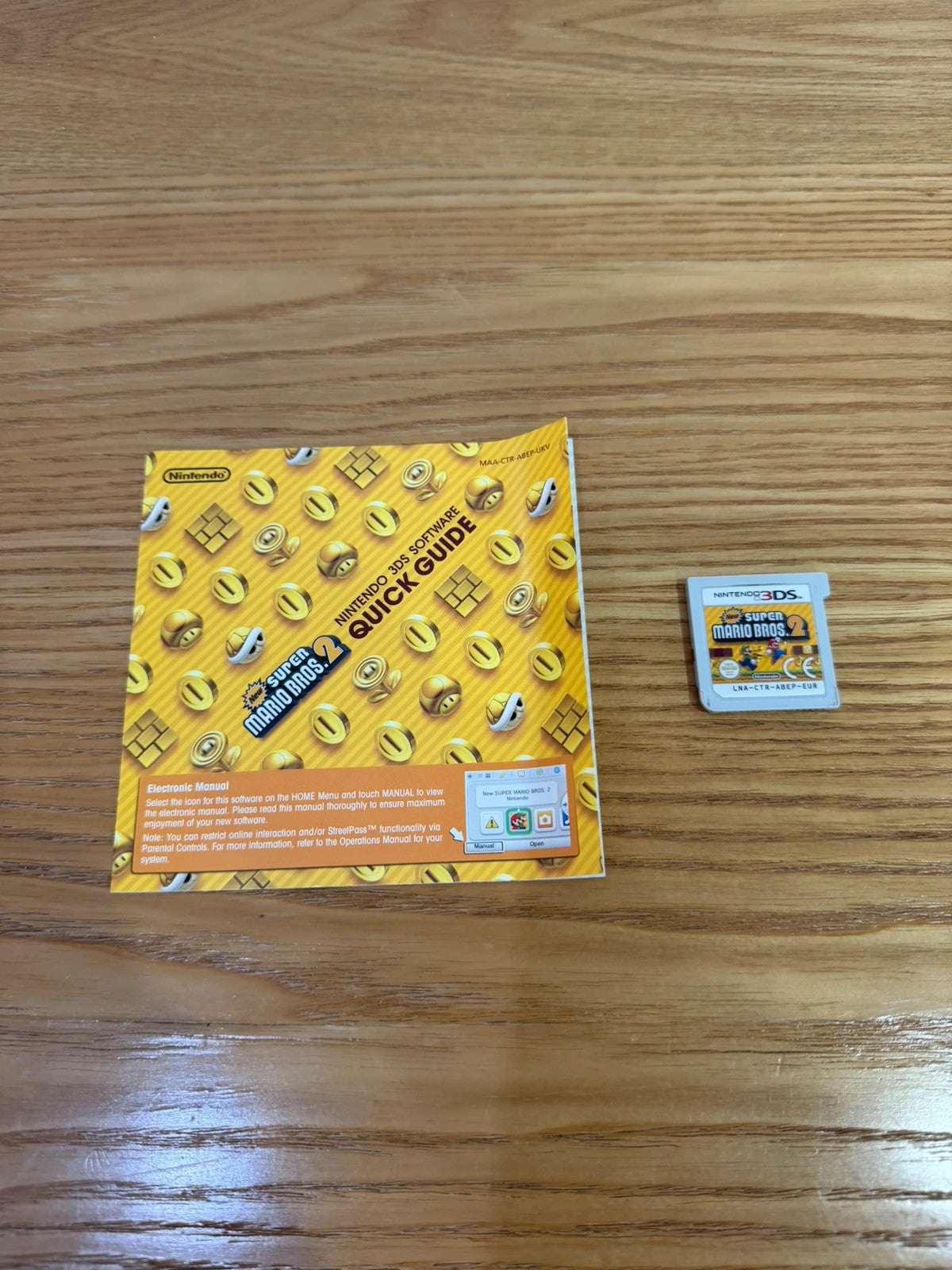 Nintendo 3DS New Super Mario Bros 2 game cartridge with case and manual in very good condition.