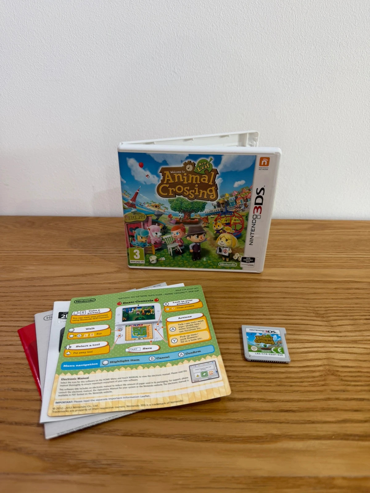 Animal Crossing New Leaf Nintendo 3DS game cartridge with manual and case in very good condition.
