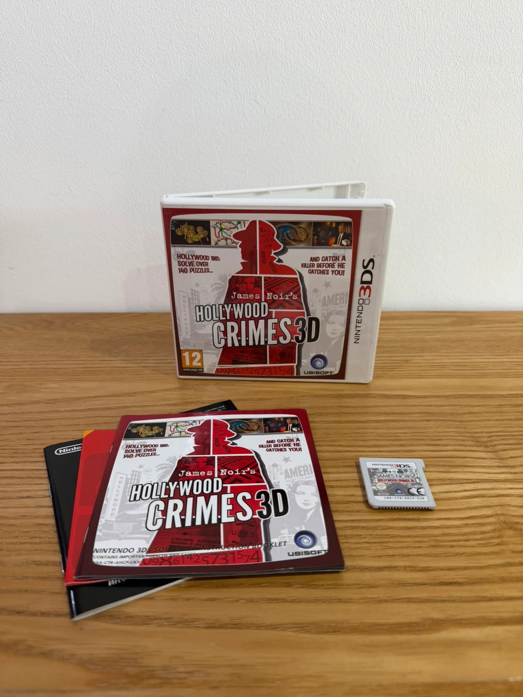 James Noir's Hollywood Crimes 3D Nintendo 3DS game case with manual and cartridge.