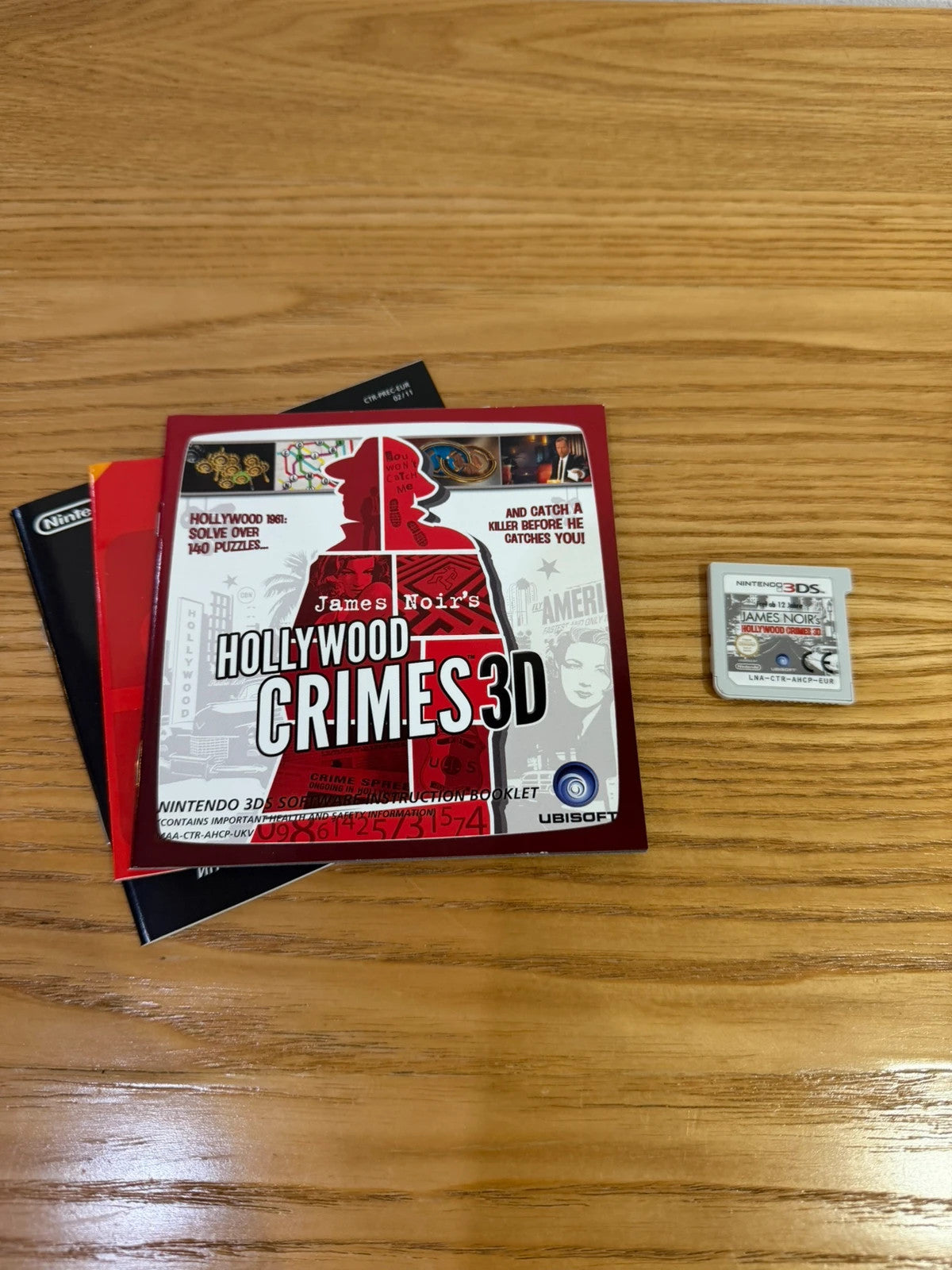 James Noir's Hollywood Crimes 3D Nintendo 3DS game case with manual and cartridge.
