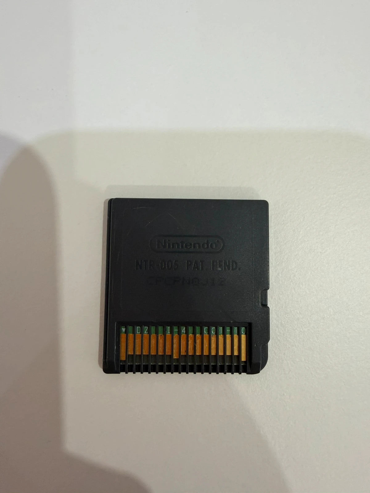 Puzzler Collection Nintendo DS game cartridge with minimal signs of use.