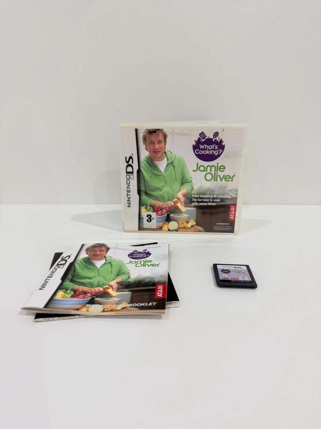 Jamie Oliver green Nintendo DS game with original case, cartridge, and manual.
