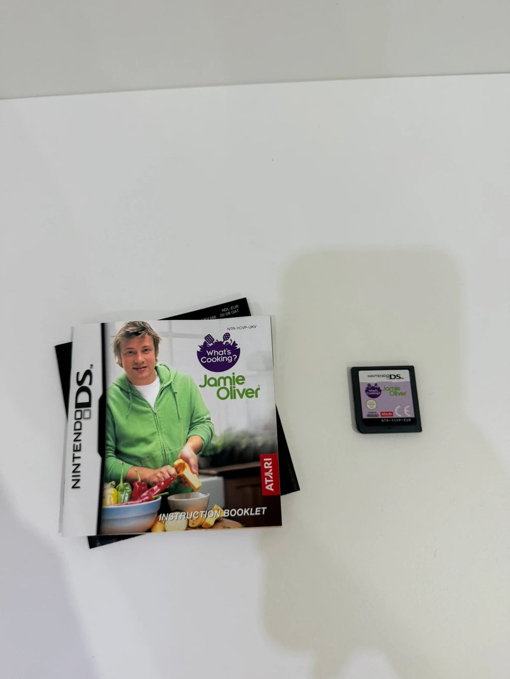 Jamie Oliver green Nintendo DS game with original case, cartridge, and manual.