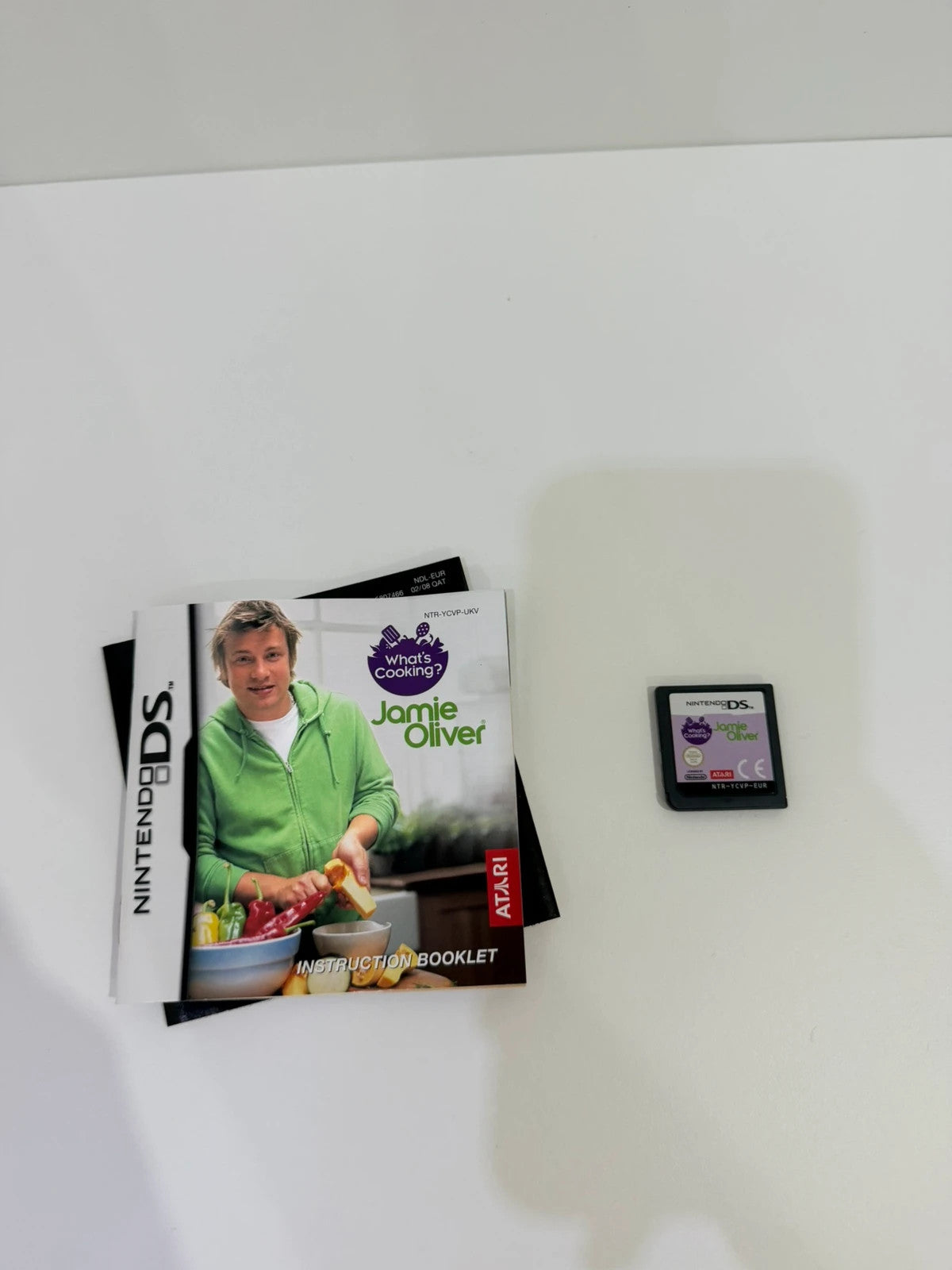 Jamie Oliver green Nintendo DS game with original case, cartridge, and manual.