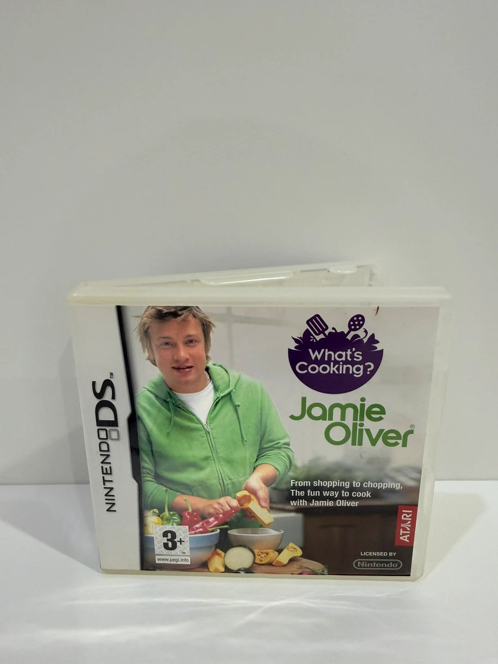 Jamie Oliver green Nintendo DS game with original case, cartridge, and manual.