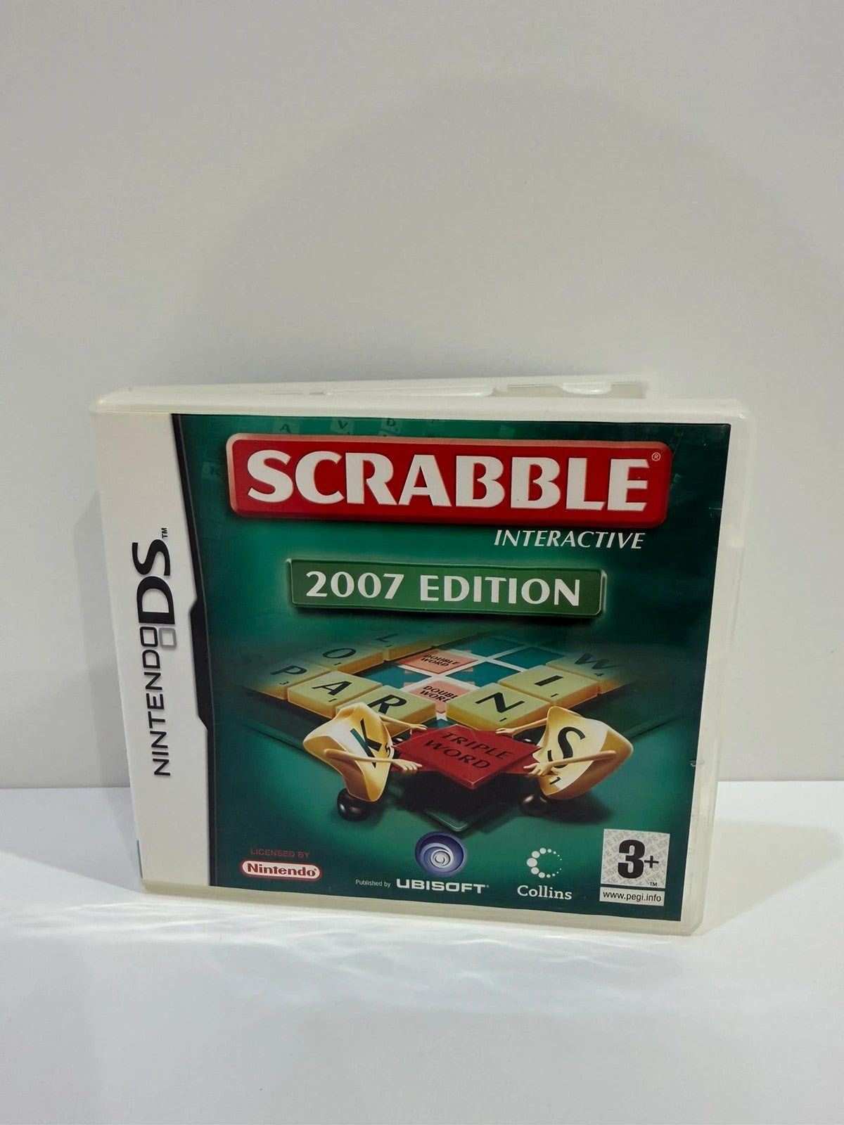 Scrabble 2007 Nintendo DS game cartridge with original case and manual, very good condition.