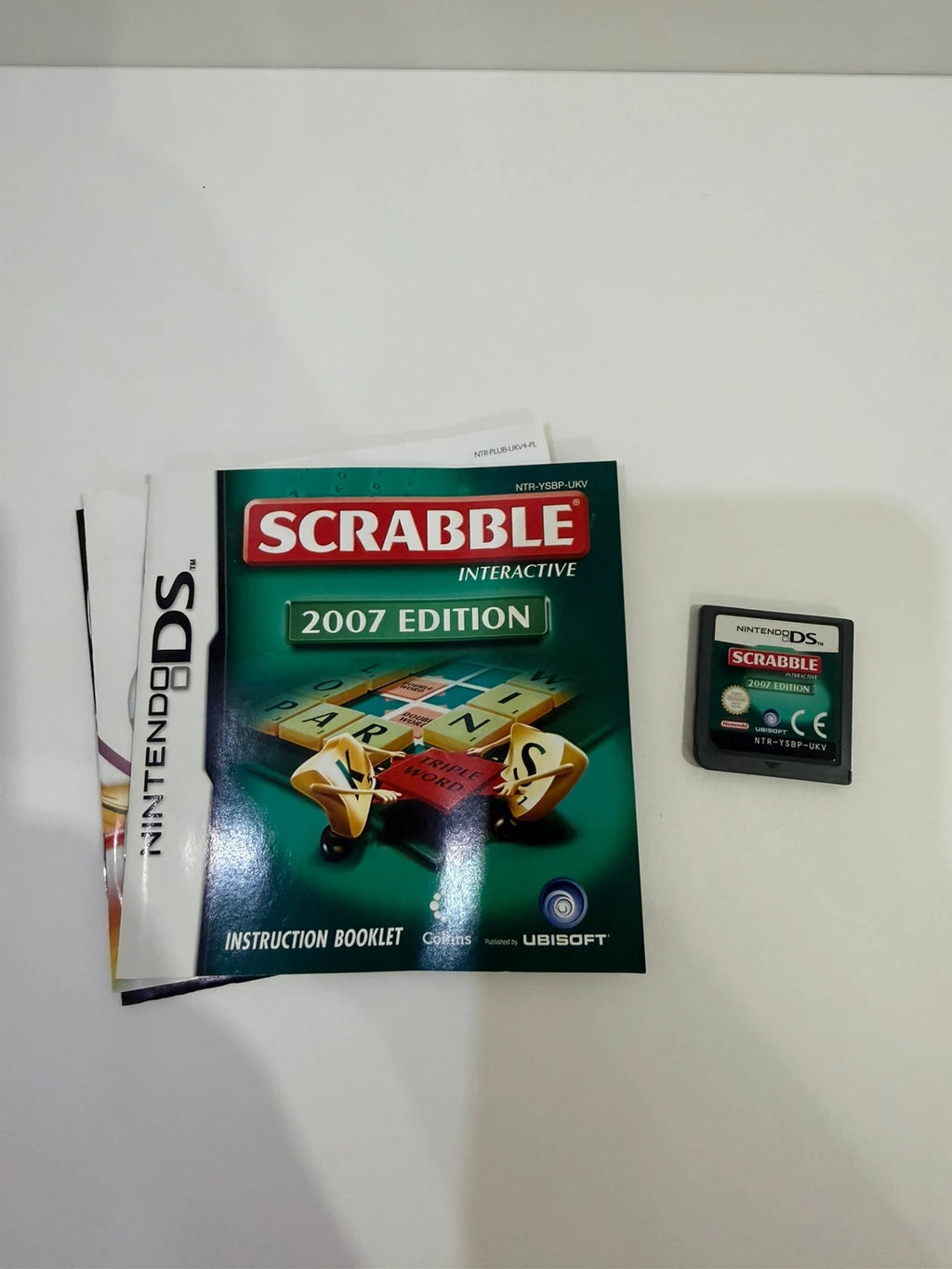 Scrabble 2007 Nintendo DS game cartridge with original case and manual, very good condition.