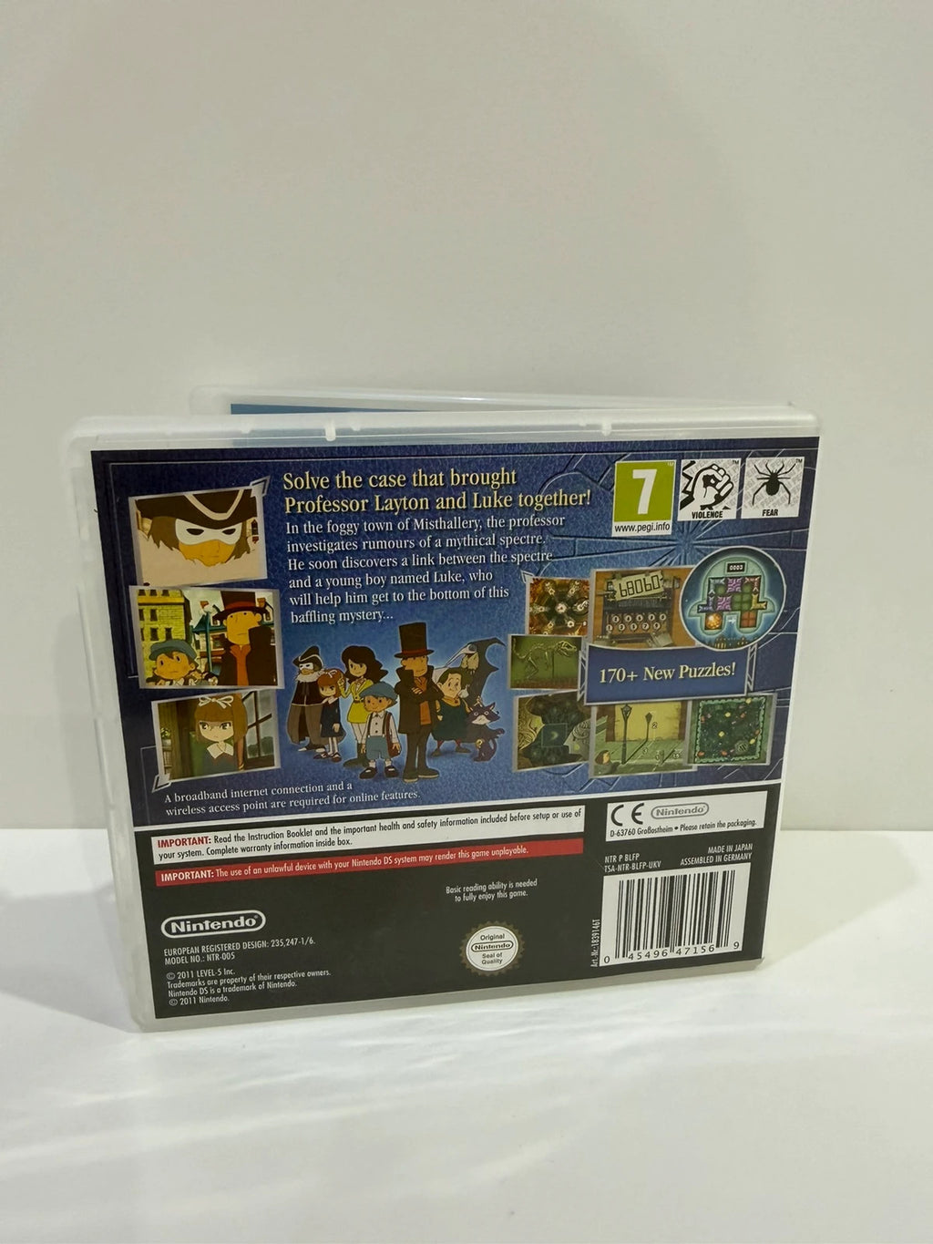 Professor Layton video game cream case with manual and cartridge, very good condition.
