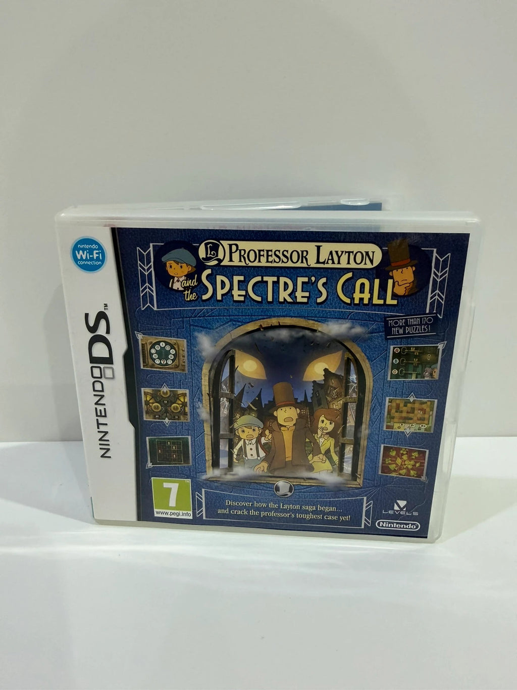 Professor Layton video game cream case with manual and cartridge, very good condition.