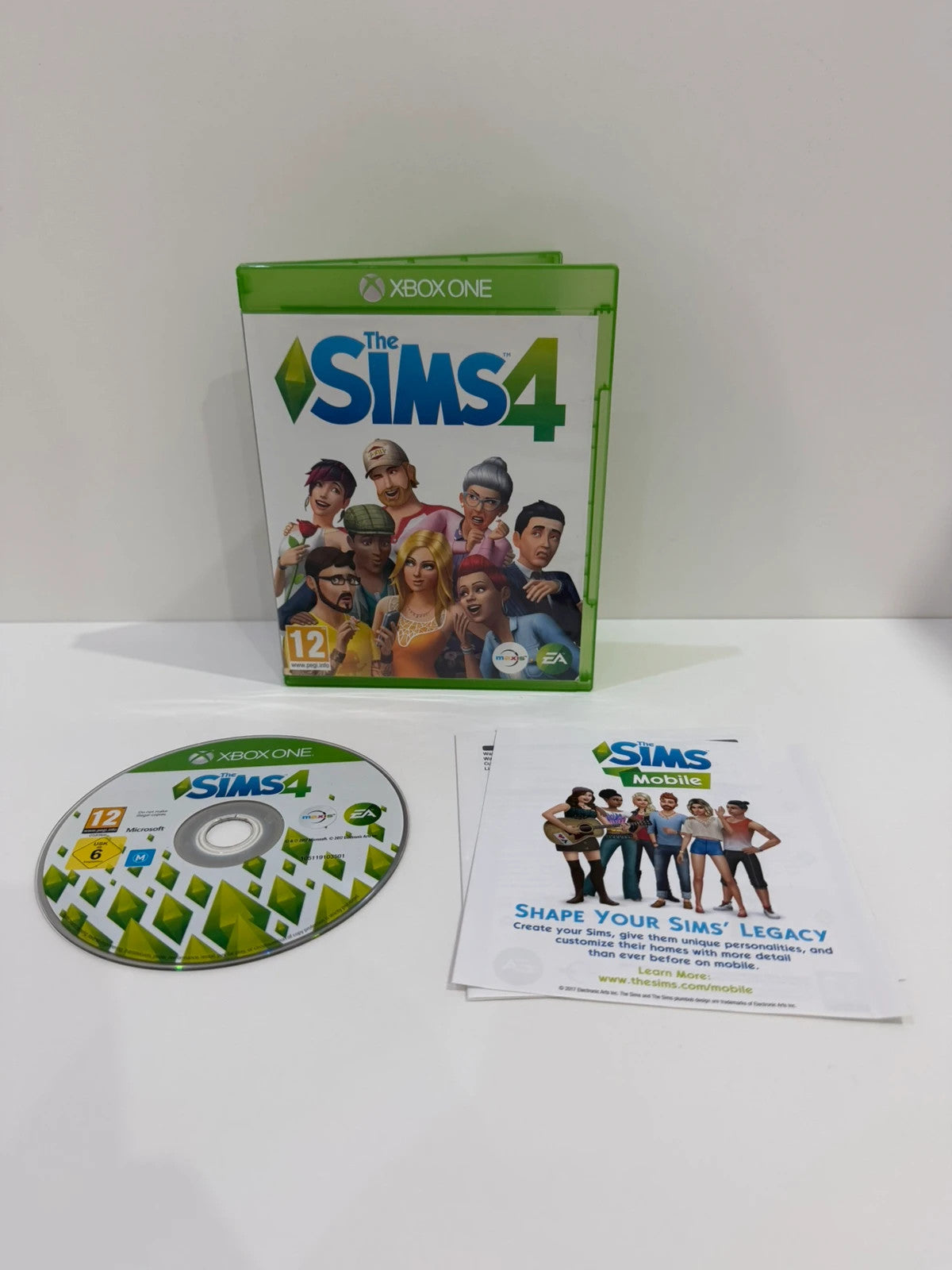 The Sims 4 Xbox One game disc with manual and case in very good condition.