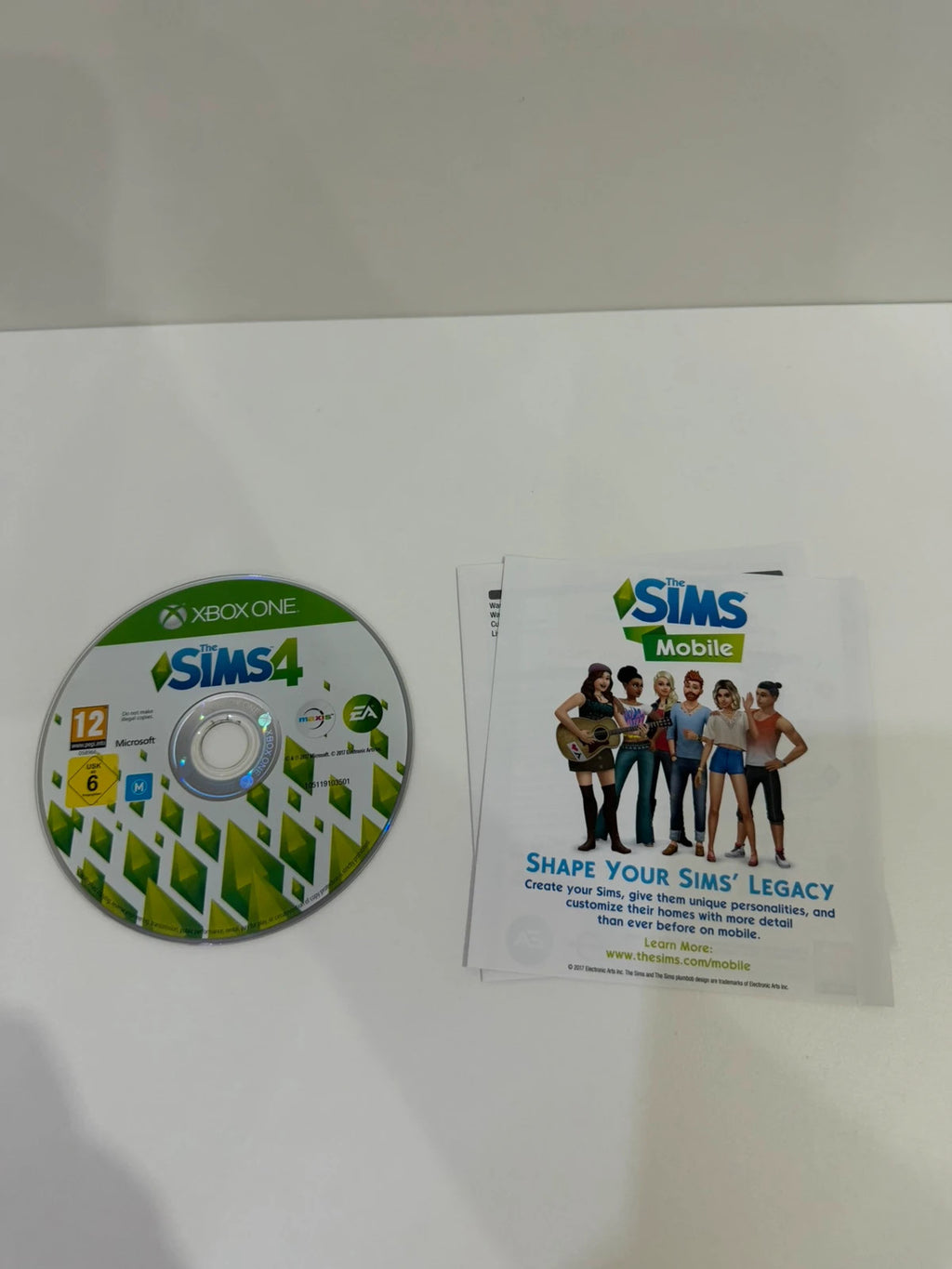 The Sims 4 Xbox One game disc with manual and case in very good condition.