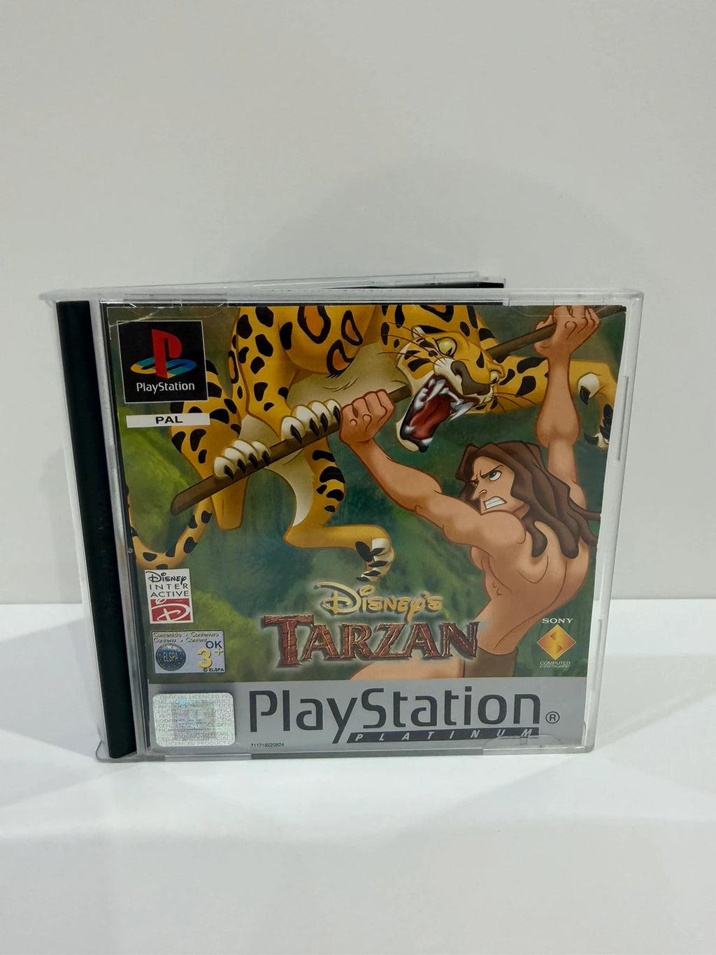 Disney Tarzan Platinum Edition PS1 game case with manual and disc, very good condition.