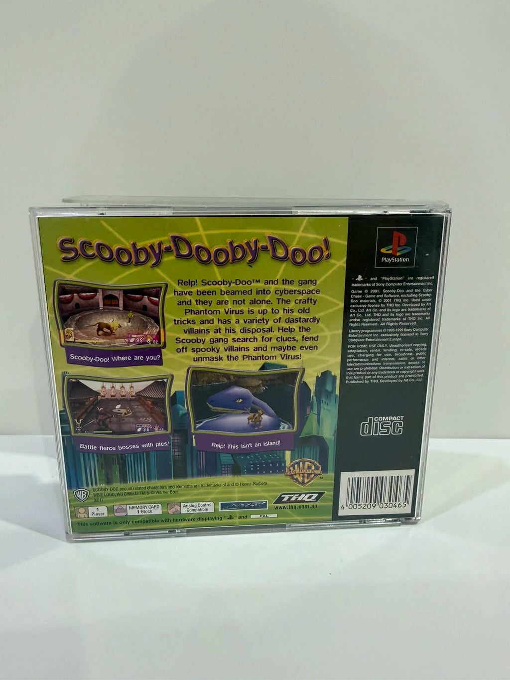 Scooby-Doo video game for PlayStation 1 with colorful cover art and manual.