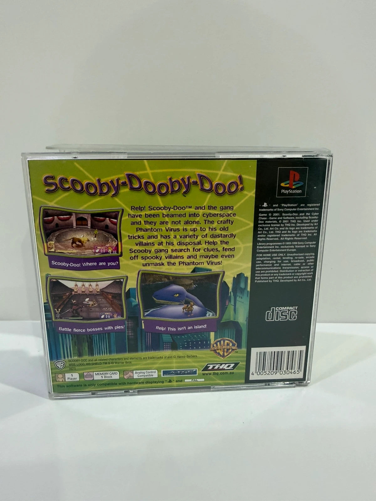 Scooby-Doo video game for PlayStation 1 with colorful cover art and manual.